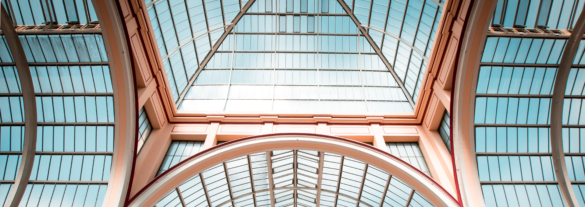 View of the East Court Roof - a structure of glass windows and columns.