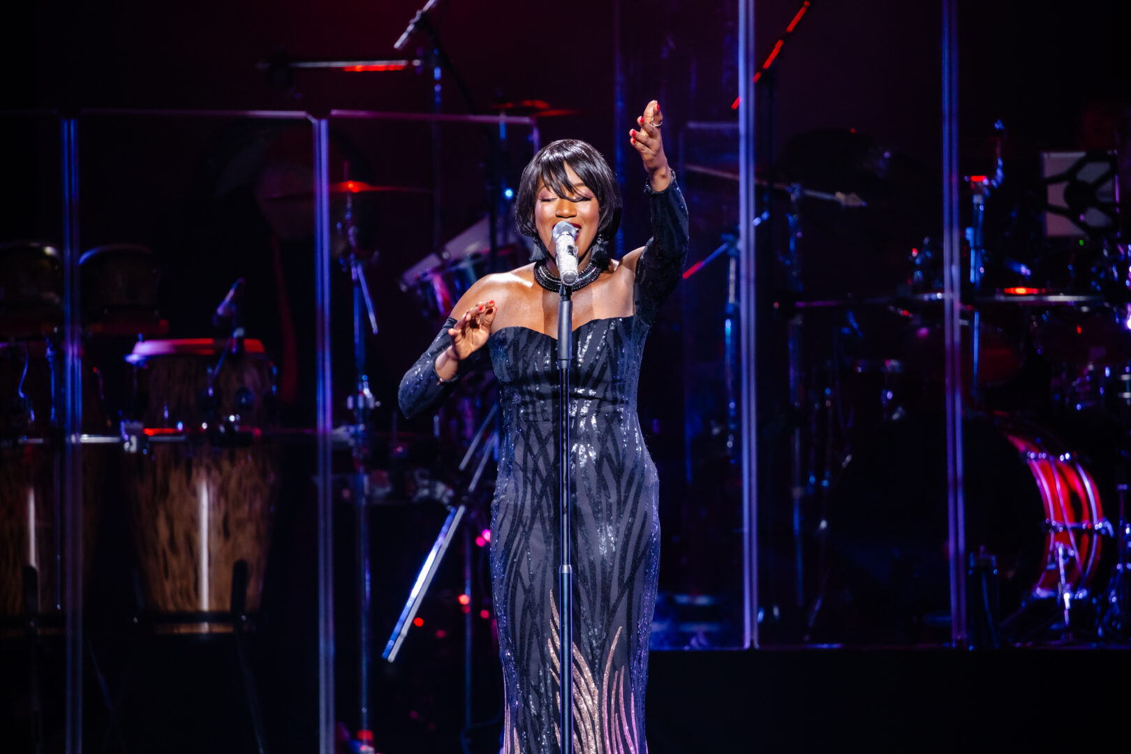 A production shot of the show 'Whitney: Queen of the night'. Whitney Houston is portrayed by Adenike Adewale.